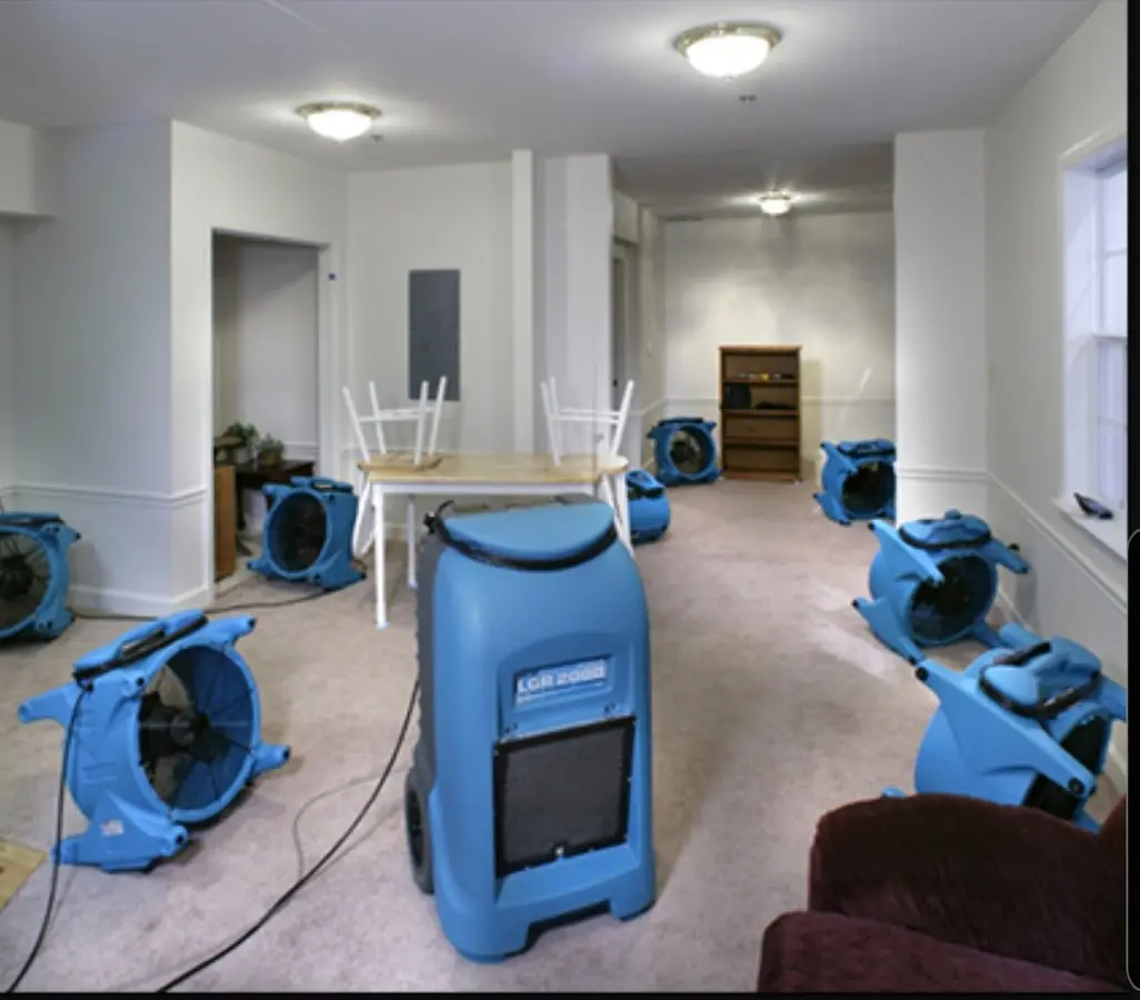 Air movers and dehumidifier setup for Water Damage Restoration in Lehigh